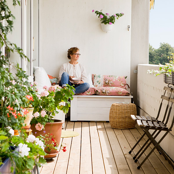 Woman on Garden Porch